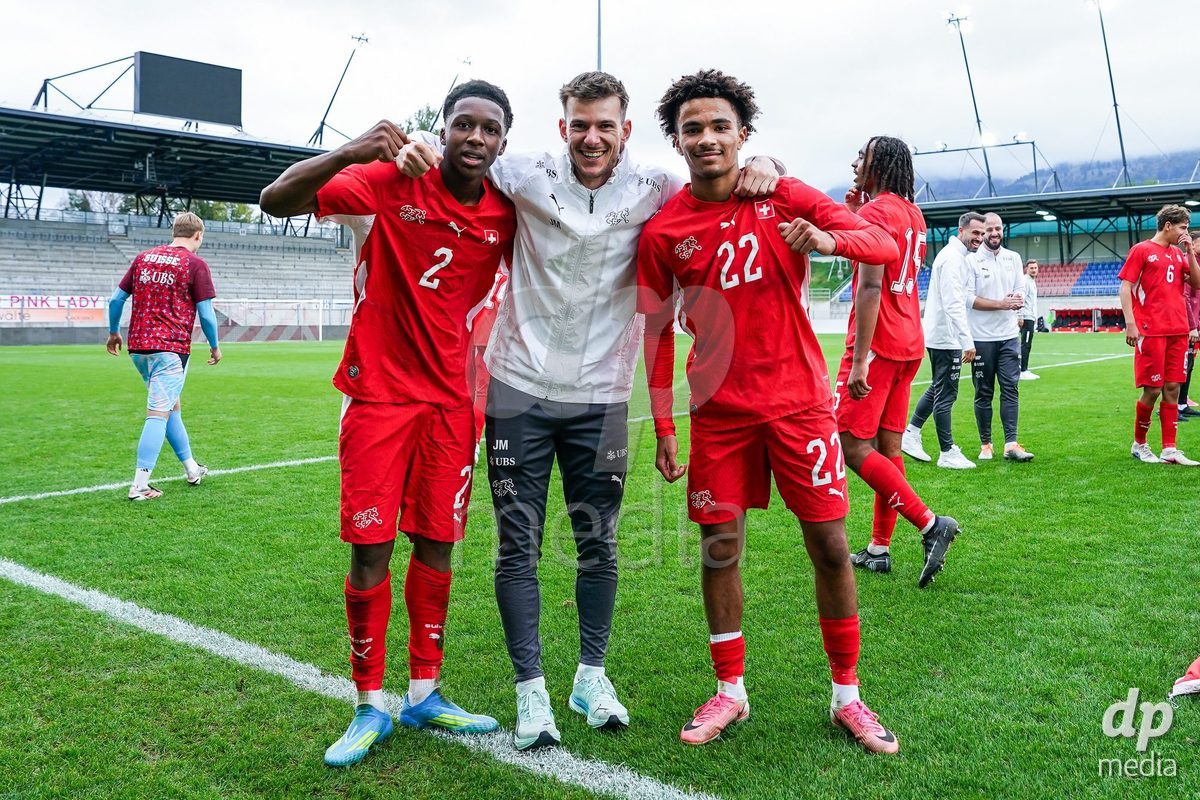 VADUZ, LIECHTENSTEIN - OCTOBER 18: Darren Okoh and Nolaan Stifani of Switzerland celebrate the victory after the UEFA European Under-17 Qualifier match between Switzerland and Spain at Rheinpark Stadion on October 18, 2026 in Vaduz, Liechtenstein.