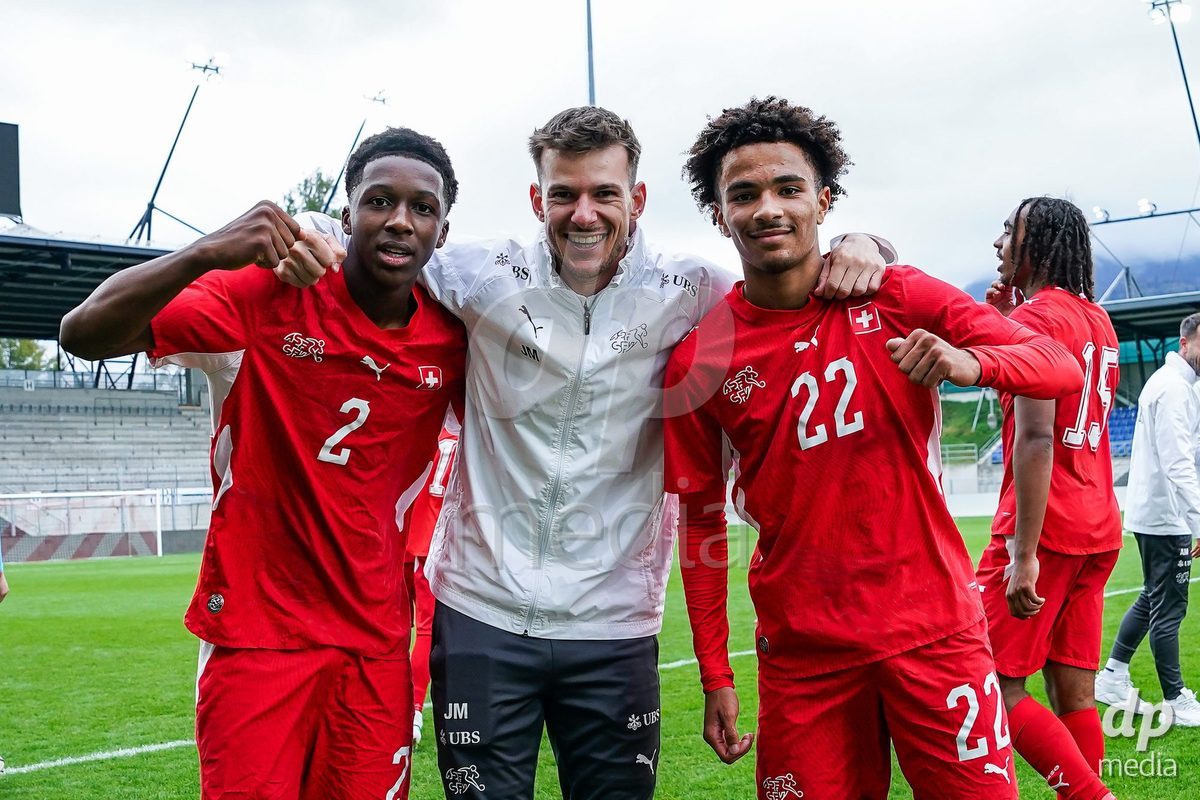 VADUZ, LIECHTENSTEIN - OCTOBER 18: Darren Okoh and Nolaan Stifani of Switzerland celebrate the victory after the UEFA European Under-17 Qualifier match between Switzerland and Spain at Rheinpark Stadion on October 18, 2026 in Vaduz, Liechtenstein.