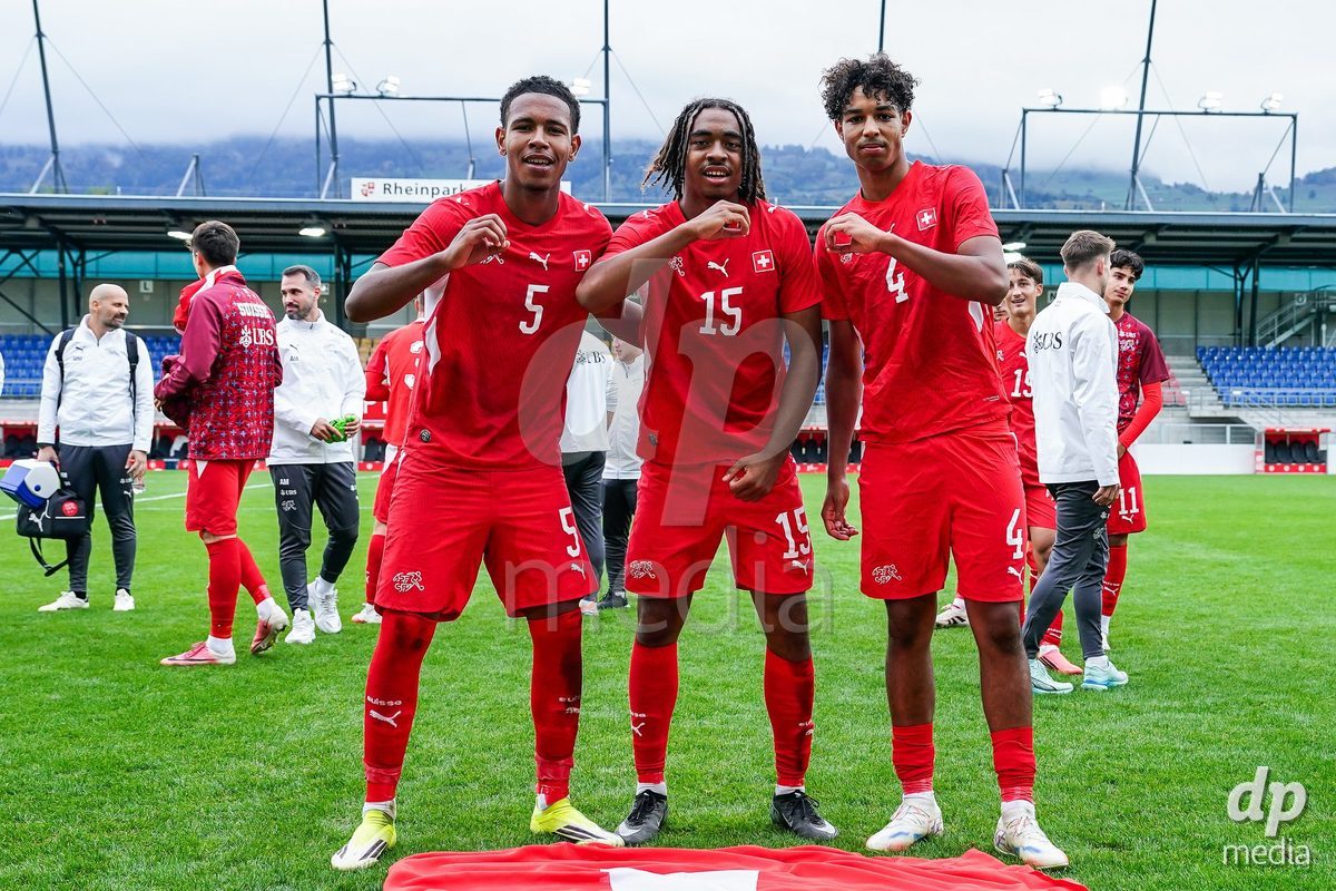 VADUZ, LIECHTENSTEIN - OCTOBER 18: Noah Kakor, Leon White and Ifeanyichukwu Onwuzulike of Switzerland celebrates the victory after during the UEFA European Under-17 Qualifier match between Switzerland and Spain at Rheinpark Stadion on October 18, 2026 in Vaduz, Liechtenstein.