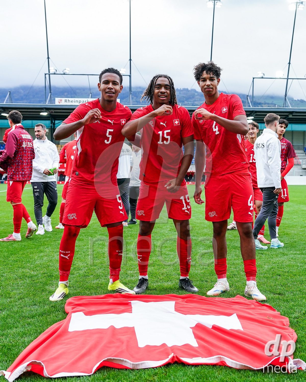 VADUZ, LIECHTENSTEIN - OCTOBER 18: Noah Kakor, Leon White and Ifeanyichukwu Onwuzulike of Switzerland celebrates the victory after during the UEFA European Under-17 Qualifier match between Switzerland and Spain at Rheinpark Stadion on October 18, 2026 in Vaduz, Liechtenstein.