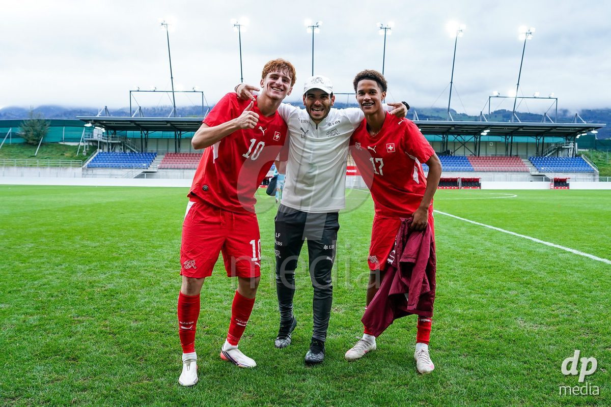 VADUZ, LIECHTENSTEIN - OCTOBER 18: Eron Kele, Luca Faillace and Kyle Kurt of Switzerland pose for a photo after the victory during the UEFA European Under-17 Qualifier match between Switzerland and Spain at Rheinpark Stadion on October 18, 2026 in Vaduz, Liechtenstein.