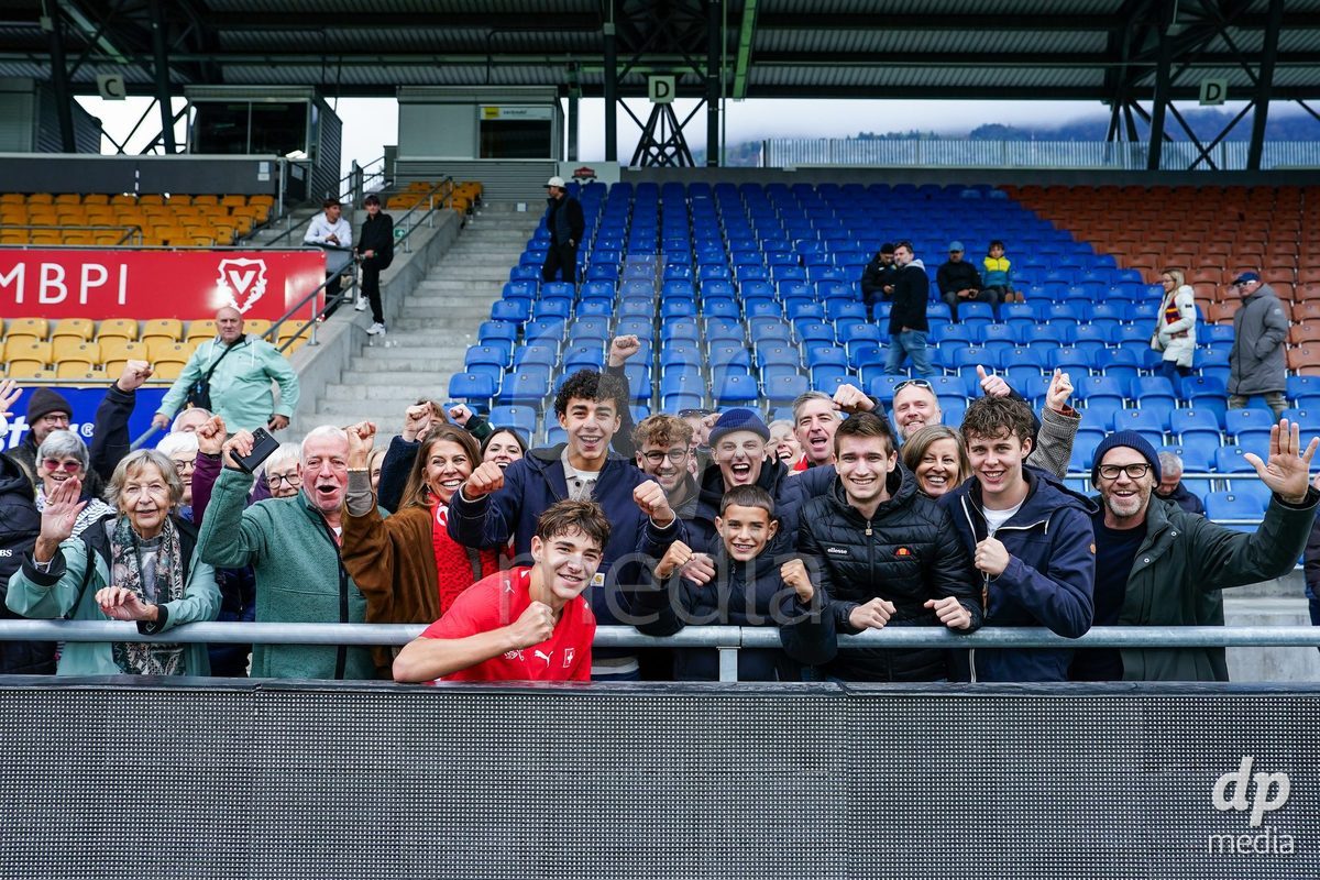 VADUZ, LIECHTENSTEIN - OCTOBER 18: Niklas Zuger of Switzerland with family and friends during the UEFA European Under-17 Qualifier match between Switzerland and Spain at Rheinpark Stadion on October 18, 2026 in Vaduz, Liechtenstein.