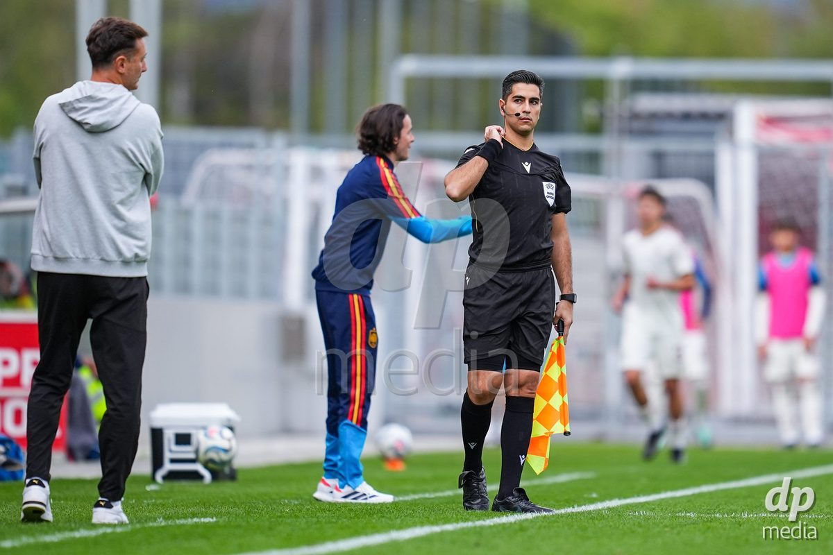 VADUZ, LIECHTENSTEIN - OCTOBER 18: Referee Polydoros Christodoulou (CYP) gestures during the UEFA European Under-17 Qualifier match between Switzerland and Spain at Rheinpark Stadion on October 18, 2026 in Vaduz, Liechtenstein.