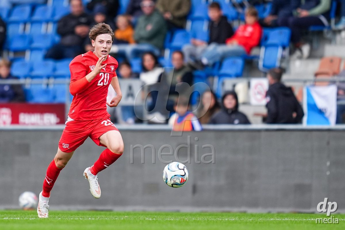 VADUZ, LIECHTENSTEIN - OCTOBER 18: Loan Thommen of Switzerland controls the ball during the UEFA European Under-17 Qualifier match between Switzerland and Spain at Rheinpark Stadion on October 18, 2026 in Vaduz, Liechtenstein.