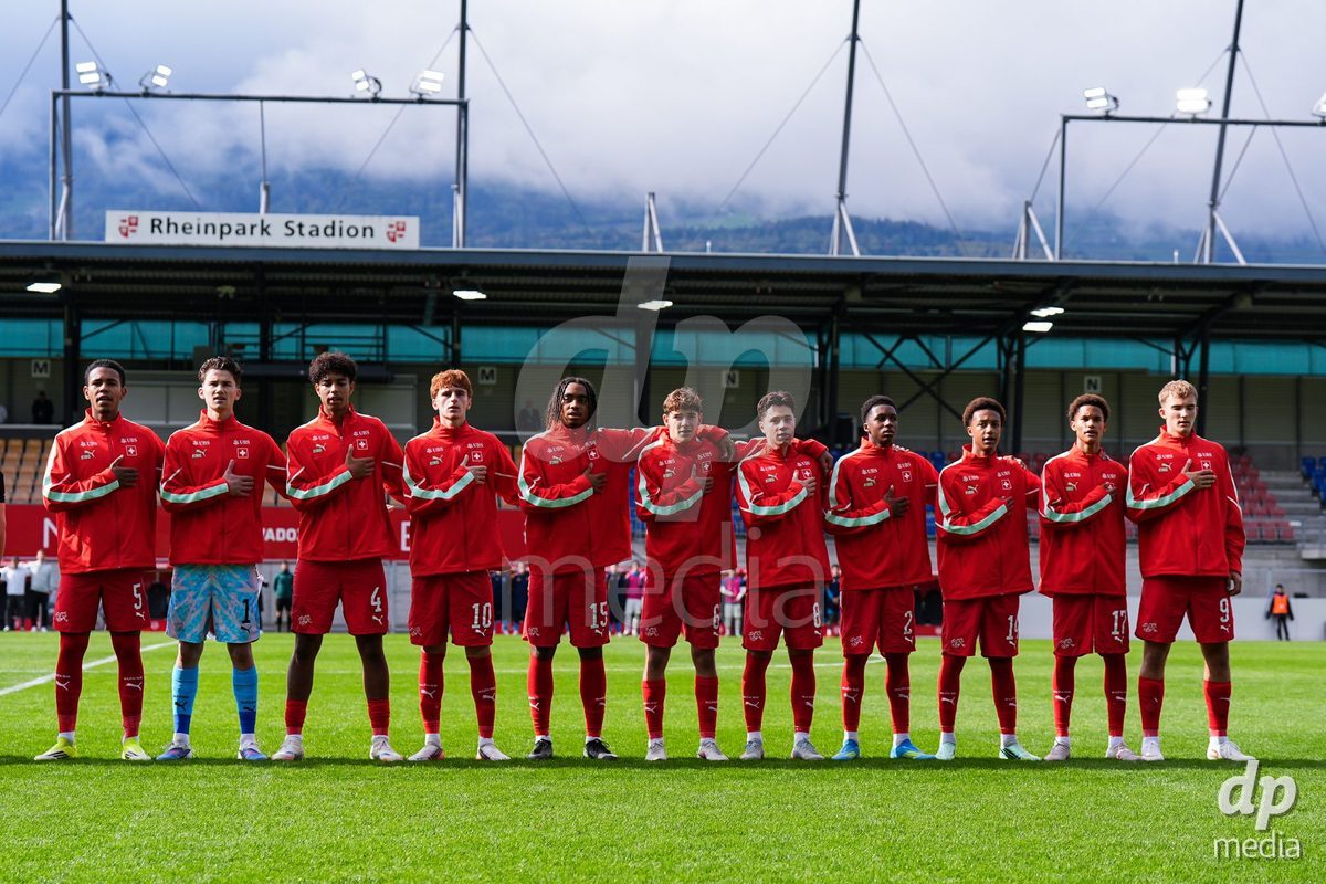 VADUZ, LIECHTENSTEIN - OCTOBER 18: Players of Switzerland during the national anthem prior to the UEFA European Under-17 Qualifier match between Switzerland and Spain at Rheinpark Stadion on October 18, 2026 in Vaduz, Liechtenstein.