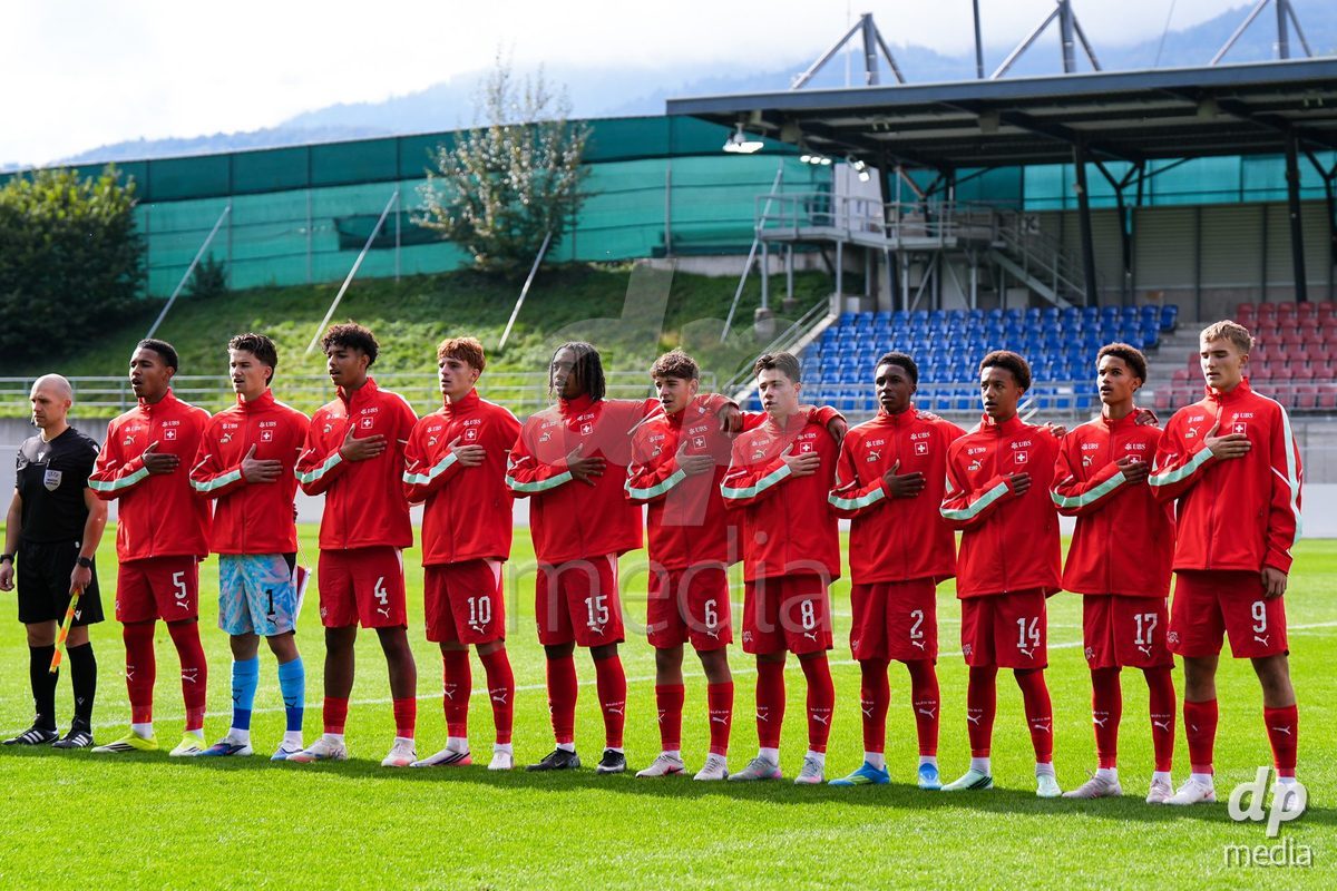 VADUZ, LIECHTENSTEIN - OCTOBER 18: Players of Switzerland during the national anthem prior to the UEFA European Under-17 Qualifier match between Switzerland and Spain at Rheinpark Stadion on October 18, 2026 in Vaduz, Liechtenstein.