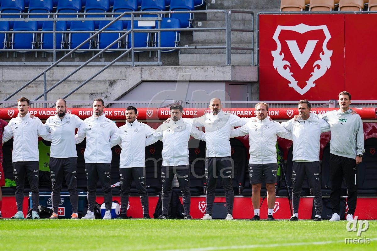 VADUZ, LIECHTENSTEIN - OCTOBER 18: Staff members of Switzerland during the national anthem prior to the UEFA European Under-17 Qualifier match between Switzerland and Spain at Rheinpark Stadion on October 18, 2026 in Vaduz, Liechtenstein.