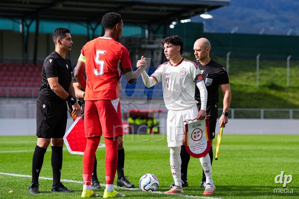 VADUZ, LIECHTENSTEIN - OCTOBER 18: Noah Kakor of Switzerland (L) and Joaquin Sanchez of Spain (R) during the coin toss during the UEFA European Under-17 Qualifier match between Switzerland and Spain at Rheinpark Stadion on October 18, 2026 in Vaduz, Liechtenstein.