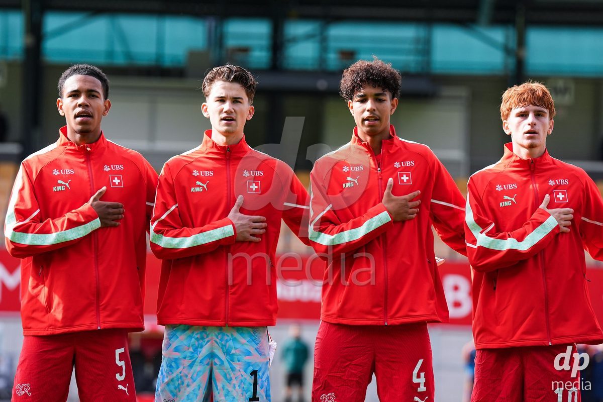VADUZ, LIECHTENSTEIN - OCTOBER 18: Noah Kakor, Yanis Emch, Ifeanyichukwu Onwuzulike and Eron Kele of Switzerland during the national anthem prior to the UEFA European Under-17 Qualifier match between Switzerland and Spain at Rheinpark Stadion on October 18, 2026 in Vaduz, Liechtenstein.