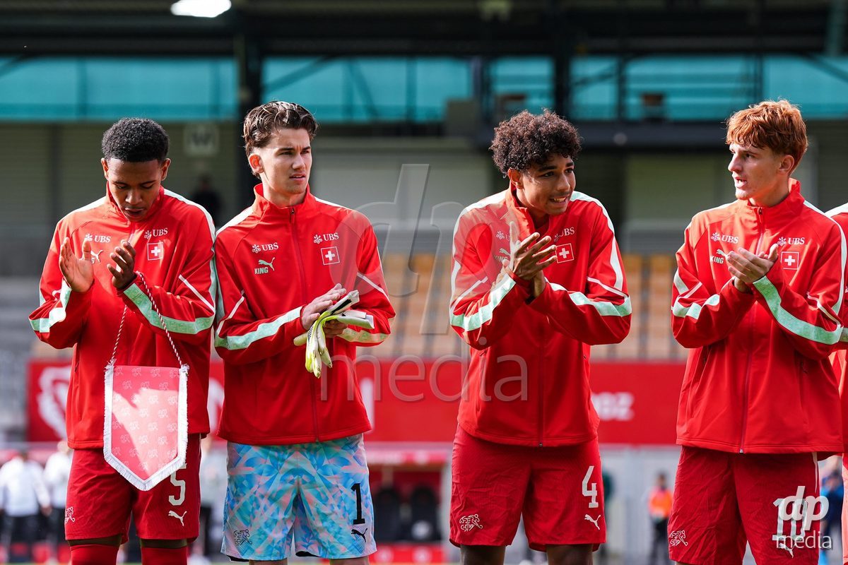 VADUZ, LIECHTENSTEIN - OCTOBER 18: Noah Kakor, Yanis Emch, Ifeanyichukwu Onwuzulike and Eron Kele of Switzerland during the national anthem prior to the UEFA European Under-17 Qualifier match between Switzerland and Spain at Rheinpark Stadion on October 18, 2026 in Vaduz, Liechtenstein.
