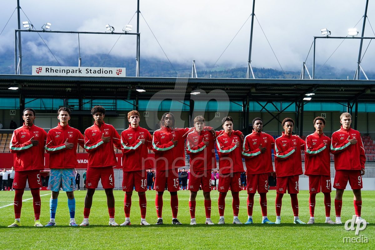 VADUZ, LIECHTENSTEIN - OCTOBER 18: Players of Switzerland  during the national anthem prior to the UEFA European Under-17 Qualifier match between Switzerland and Spain at Rheinpark Stadion on October 18, 2026 in Vaduz, Liechtenstein.