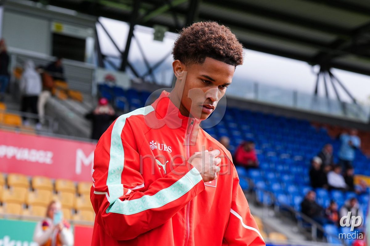 VADUZ, LIECHTENSTEIN - OCTOBER 18: Kyle Kurt of Switzerland enters for the natioanl anthem prior to the UEFA European Under-17 Qualifier match between Switzerland and Spain at Rheinpark Stadion on October 18, 2026 in Vaduz, Liechtenstein.