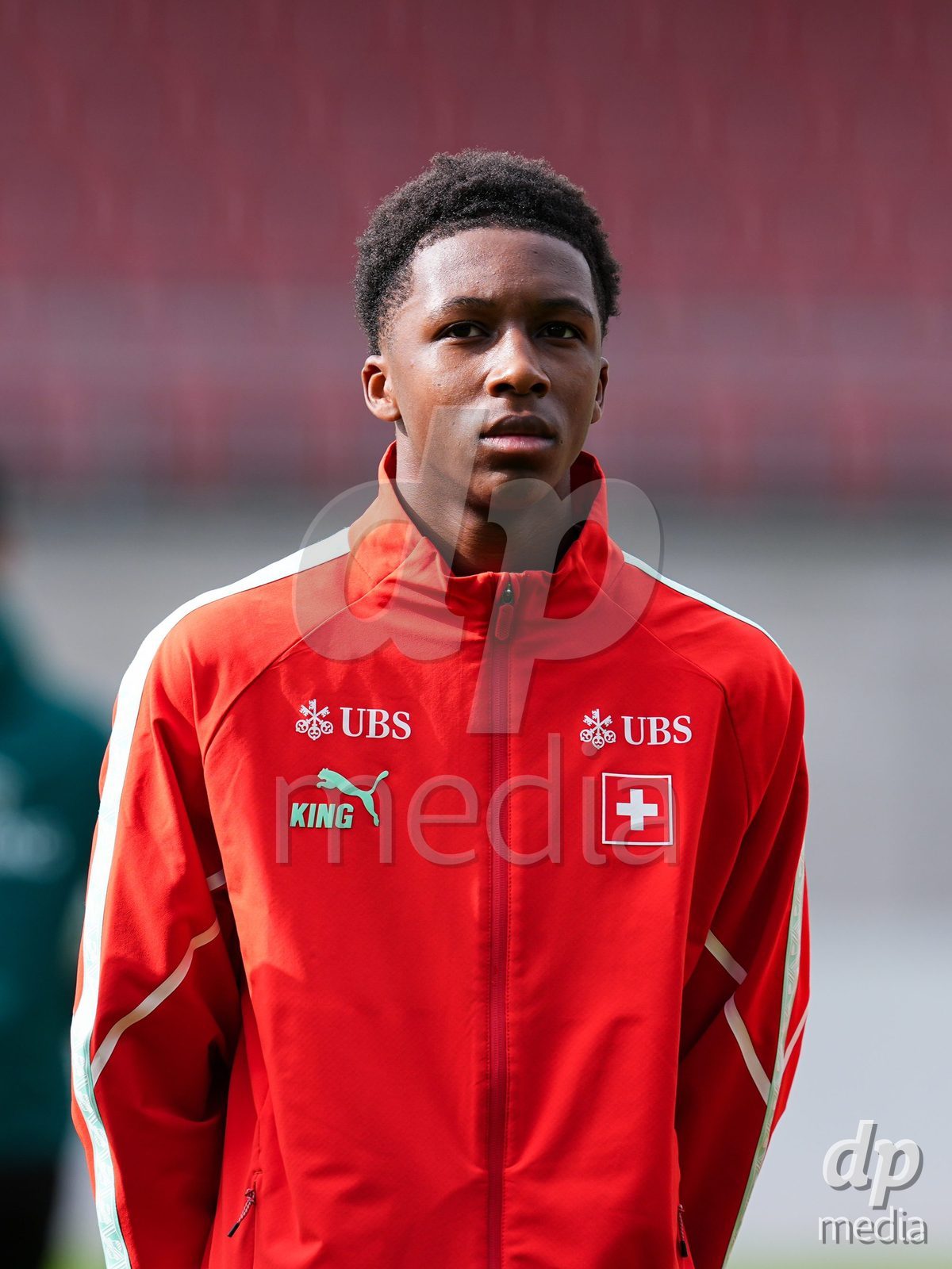 VADUZ, LIECHTENSTEIN - OCTOBER 18: Portrait (headshot/close up) of Darren Okoh of Switzerland during the national anthem prior to the UEFA European Under-17 Qualifier match between Switzerland and Spain at Rheinpark Stadion on October 18, 2026 in Vaduz, Liechtenstein.