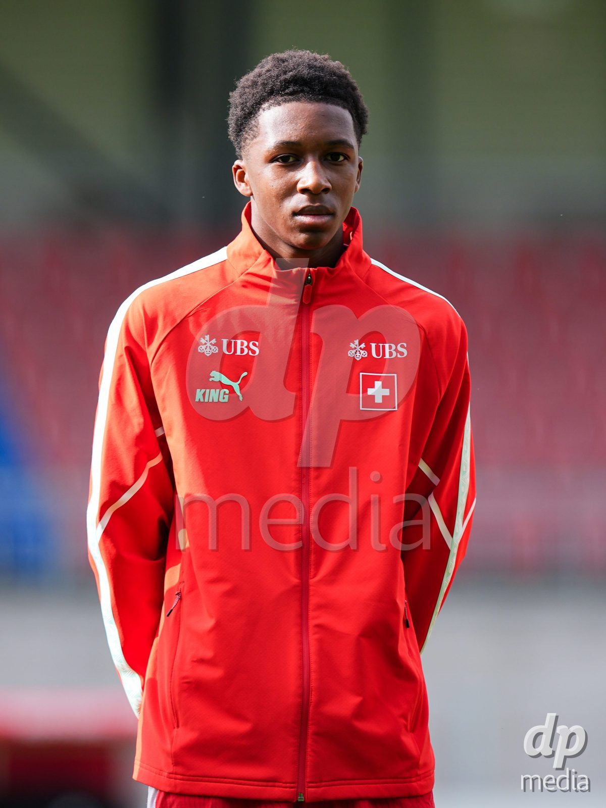 VADUZ, LIECHTENSTEIN - OCTOBER 18: Portrait (headshot/close up) of Darren Okoh of Switzerland during the national anthem prior to the UEFA European Under-17 Qualifier match between Switzerland and Spain at Rheinpark Stadion on October 18, 2026 in Vaduz, Liechtenstein.