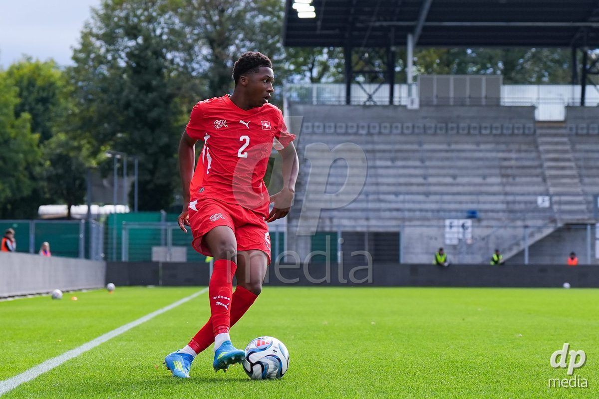 VADUZ, LIECHTENSTEIN - OCTOBER 18: Darren Okoh of Switzerland controls the ball during the UEFA European Under-17 Qualifier match between Switzerland and Spain at Rheinpark Stadion on October 18, 2026 in Vaduz, Liechtenstein.