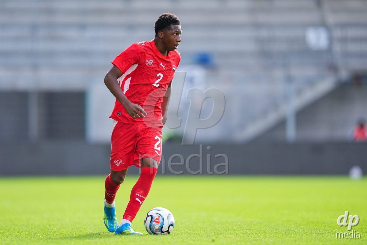 VADUZ, LIECHTENSTEIN - OCTOBER 18: Darren Okoh of Switzerland controls the ball during the UEFA European Under-17 Qualifier match between Switzerland and Spain at Rheinpark Stadion on October 18, 2026 in Vaduz, Liechtenstein.