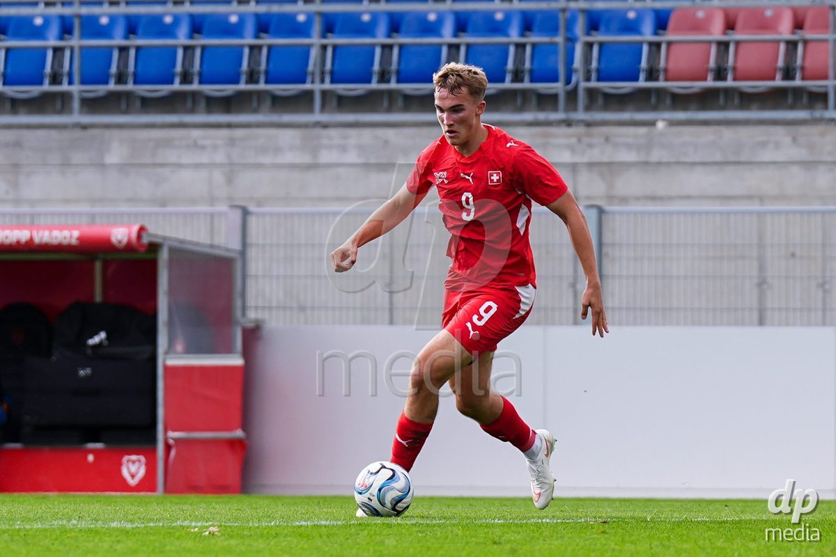 VADUZ, LIECHTENSTEIN - OCTOBER 18: Niko Cavka of Switzerland controls the ball during the UEFA European Under-17 Qualifier match between Switzerland and Spain at Rheinpark Stadion on October 18, 2026 in Vaduz, Liechtenstein.
