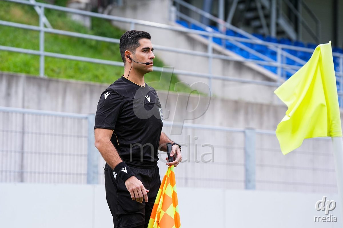 VADUZ, LIECHTENSTEIN - OCTOBER 18: Referee Polydoros Christodoulou (CYP) looks on during the UEFA European Under-17 Qualifier match between Switzerland and Spain at Rheinpark Stadion on October 18, 2026 in Vaduz, Liechtenstein.