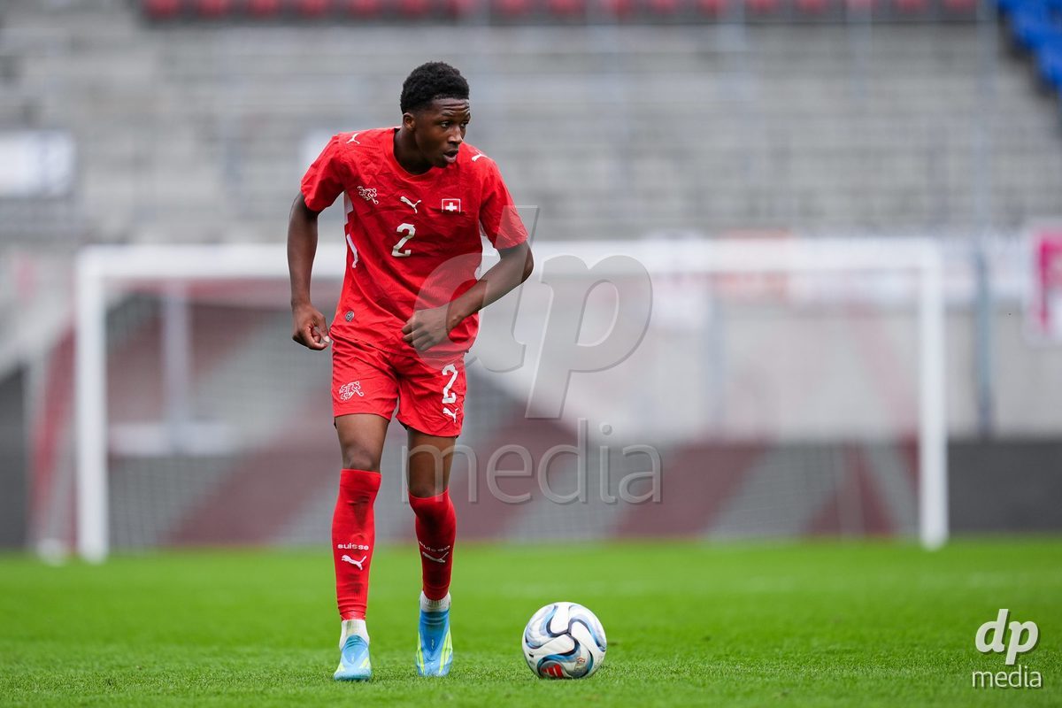 VADUZ, LIECHTENSTEIN - OCTOBER 18: Darren Okoh of Switzerland controls the ball during the UEFA European Under-17 Qualifier match between Switzerland and Spain at Rheinpark Stadion on October 18, 2026 in Vaduz, Liechtenstein.