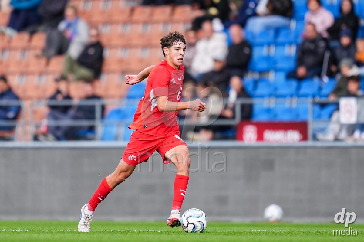 VADUZ, LIECHTENSTEIN - OCTOBER 18: Niklas Zuger of Switzerland brings the ball forward during the UEFA European Under-17 Qualifier match between Switzerland and Spain at Rheinpark Stadion on October 18, 2026 in Vaduz, Liechtenstein.