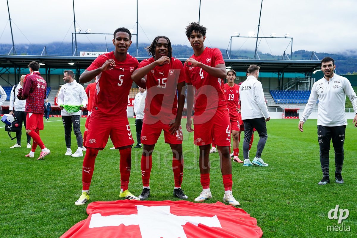VADUZ, LIECHTENSTEIN - OCTOBER 18: Noah Kakor, Leon White and Ifeanyichukwu Onwuzulike of Switzerland celebrates the victory after during the UEFA European Under-17 Qualifier match between Switzerland and Spain at Rheinpark Stadion on October 18, 2026 in Vaduz, Liechtenstein.