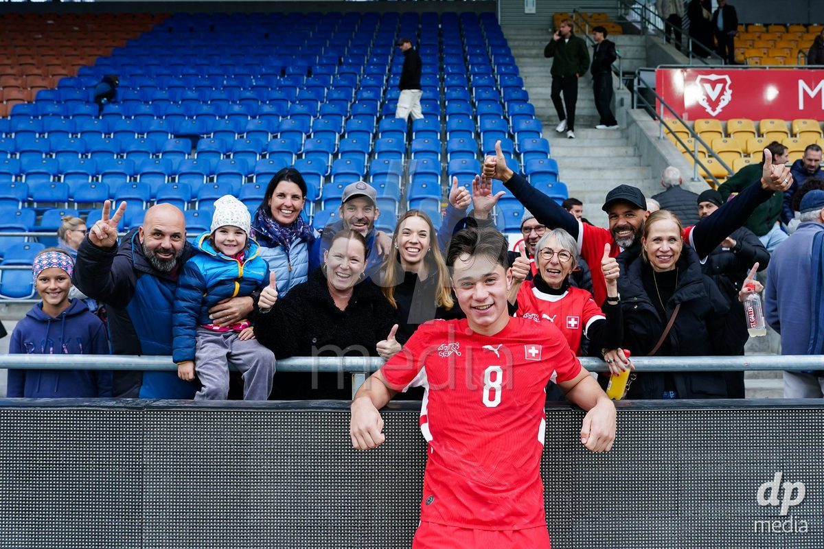 VADUZ, LIECHTENSTEIN - OCTOBER 18: Leandro Cottiati of Switzerland with family and friends after the victory during the UEFA European Under-17 Qualifier match between Switzerland and Spain at Rheinpark Stadion on October 18, 2026 in Vaduz, Liechtenstein.