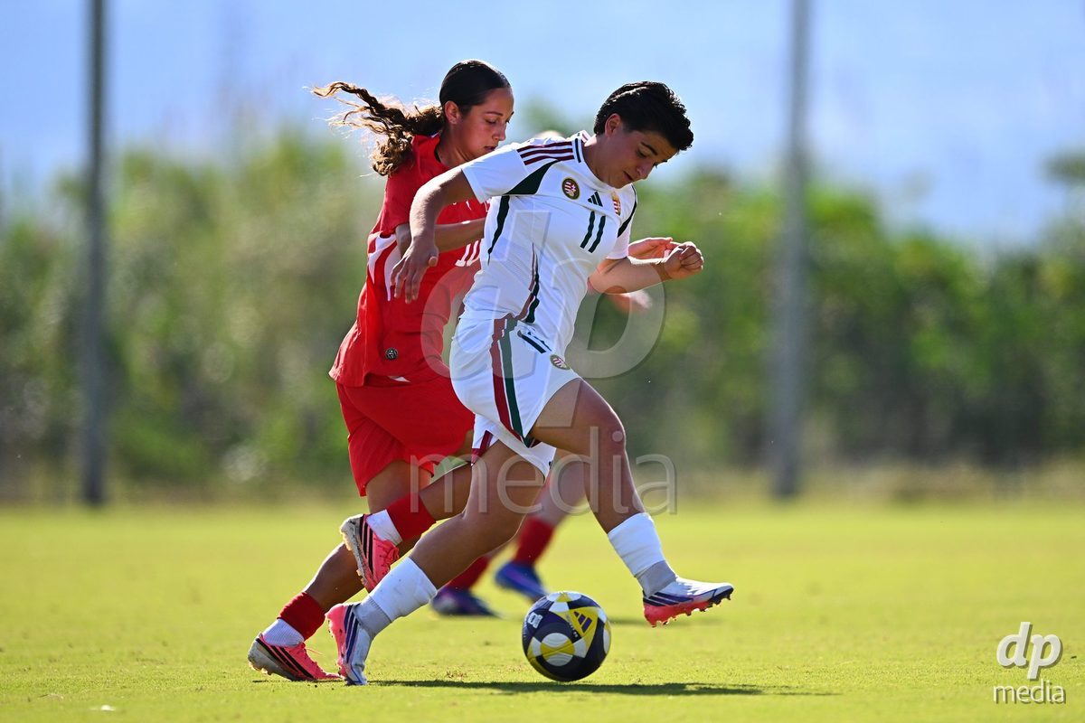OLIVA NOVA, SPAIN - OCTOBER 22: Melissa Mettraux of Switzerland competes for the ball with Korina Oleksza of Hungary during the International Women's Friendly match between Hungary U17 and Switzerland U17 at Oliva Nova Sports Center on October 22, 2026 in Oliva Nova, Spain.