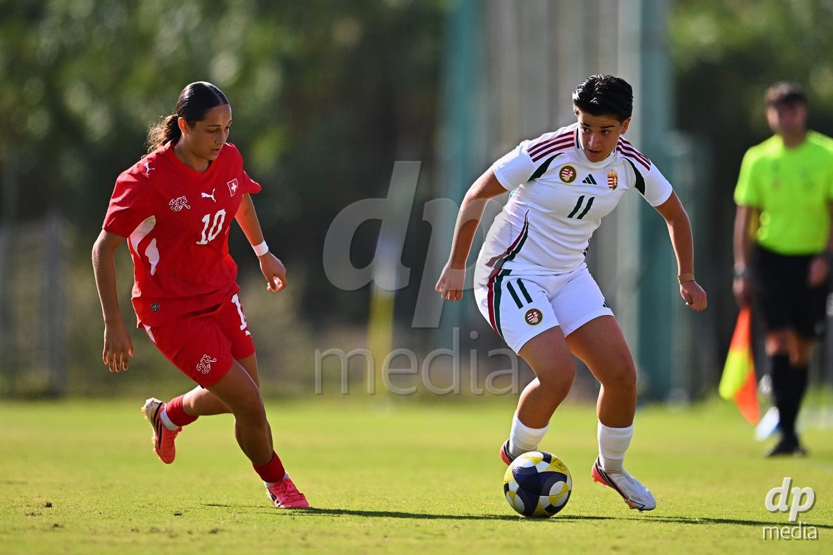 OLIVA NOVA, SPAIN - OCTOBER 22: Melissa Mettraux of Switzerland competes for the ball with Korina Oleksza of Hungary during the International Women's Friendly match between Hungary U17 and Switzerland U17 at Oliva Nova Sports Center on October 22, 2026 in Oliva Nova, Spain.