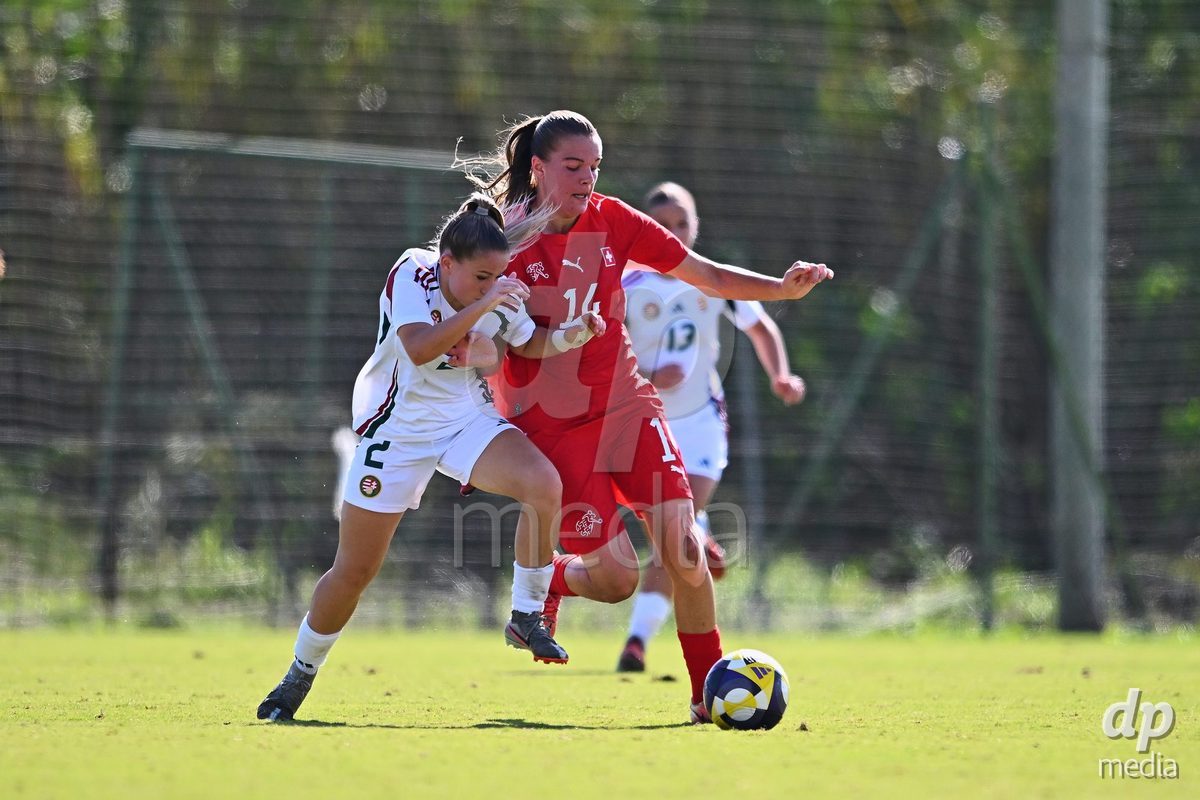OLIVA NOVA, SPAIN - OCTOBER 22: Naira Schierz of Switzerland competes for the ball with Liza Varga of Hungary during the International Women's Friendly match between Hungary U17 and Switzerland U17 at Oliva Nova Sports Center on October 22, 2026 in Oliva Nova, Spain.
