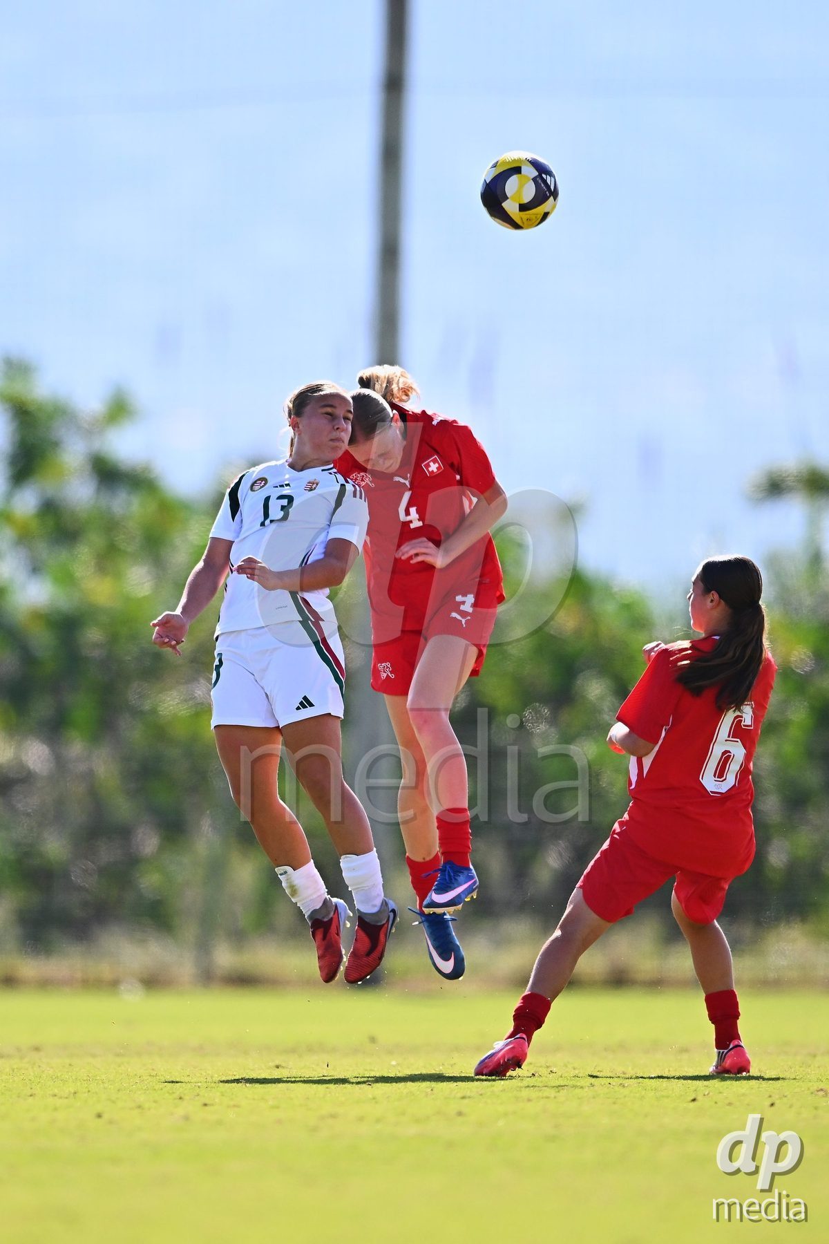OLIVA NOVA, SPAIN - OCTOBER 22: Mara Arnold of Switzerland competes for the ball with Panna Lakatos of Hungary during the International Women's Friendly match between Hungary U17 and Switzerland U17 at Oliva Nova Sports Center on October 22, 2026 in Oliva Nova, Spain.