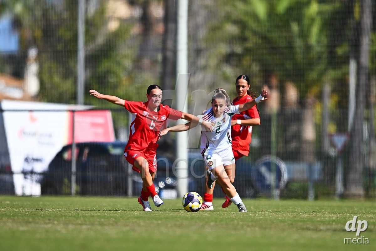 OLIVA NOVA, SPAIN - OCTOBER 22: Amelie Zorgiebel of Switzerland competes for the ball with Liza Varga of Hungary during the International Women's Friendly match between Hungary U17 and Switzerland U17 at Oliva Nova Sports Center on October 22, 2026 in Oliva Nova, Spain.