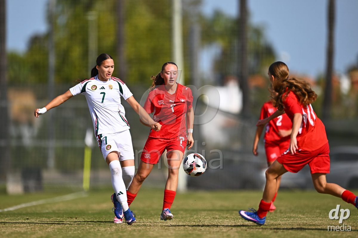 OLIVA NOVA, SPAIN - OCTOBER 24: Lena Marie Winter of Switzerland competes for the ball with Lara Toro of Hungary during the International Women's Friendly match between Switzerland U17 and Hungary U17 at Oliva Nova Sports Center on October 24, 2026 in Oliva Nova, Spain.