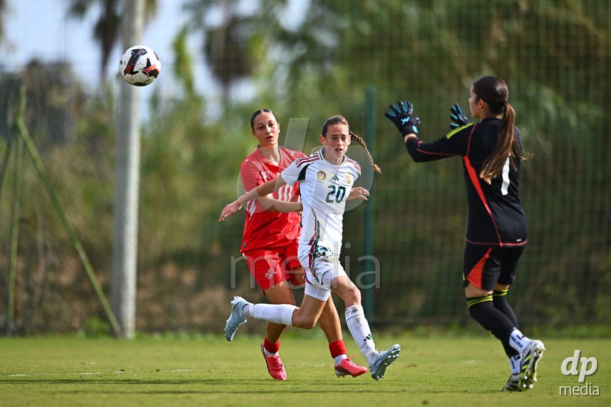 OLIVA NOVA, SPAIN - OCTOBER 24: Melissa Mettraux of Switzerland competes for the ball with Hedi Szanto of Hungary during the International Women's Friendly match between Switzerland U17 and Hungary U17 at Oliva Nova Sports Center on October 24, 2026 in Oliva Nova, Spain.