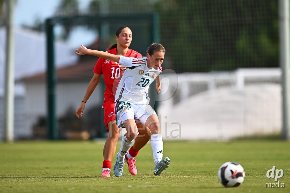 OLIVA NOVA, SPAIN - OCTOBER 24: Melissa Mettraux of Switzerland competes for the ball with Hedi Szanto of Hungary during the International Women's Friendly match between Switzerland U17 and Hungary U17 at Oliva Nova Sports Center on October 24, 2026 in Oliva Nova, Spain.