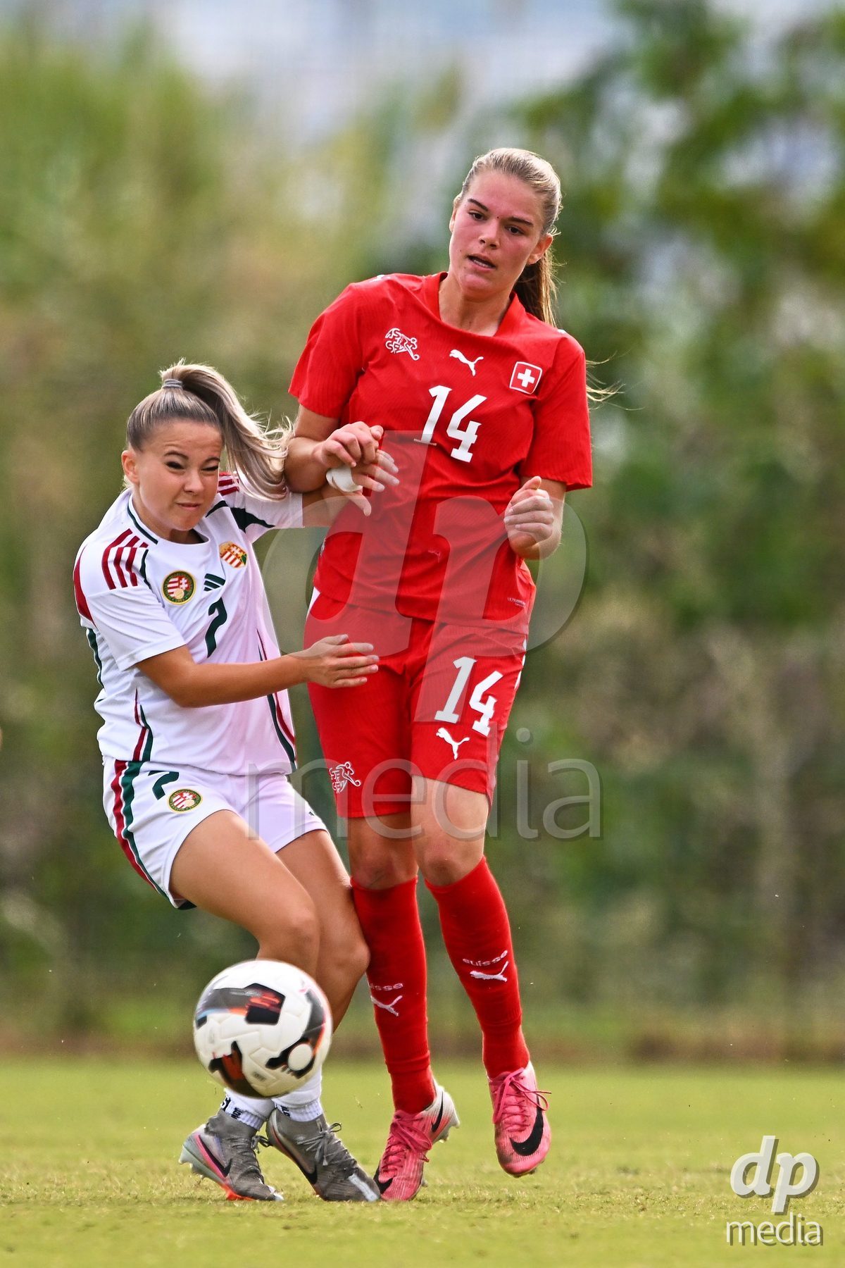OLIVA NOVA, SPAIN - OCTOBER 24: Naira Schierz of Switzerland competes for the ball with Lara Toro of Hungary during the International Women's Friendly match between Switzerland U17 and Hungary U17 at Oliva Nova Sports Center on October 24, 2026 in Oliva Nova, Spain.