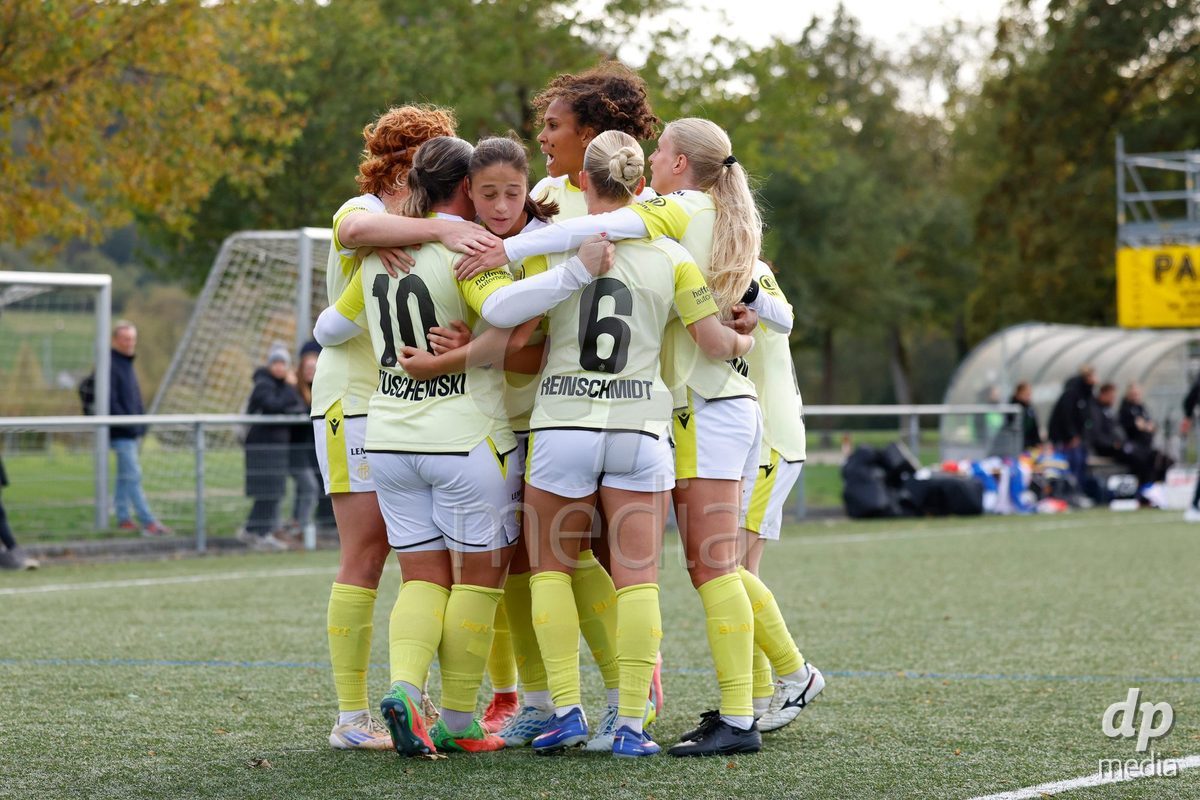 AARAU, SWITZERLAND - OCTOBER 24: Julia Matuschewski of FC Basel 1893 celebrating with Team of FC Basel 1893 after scoring the second goal during the AXA Women's Cup match between FC Aarau Frauen and FC Basel 1893 at Sportanlage Schachen on October 24, 2026 in Aarau, Switzerland.