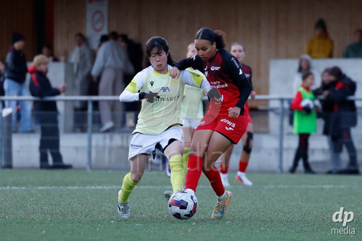 AARAU, SWITZERLAND - OCTOBER 24: Mai Hirata of FC Basel 1893 and Joy Steck of FC Aarau Frauen fighting for the ball during the AXA Women's Cup match between FC Aarau Frauen and FC Basel 1893 at Sportanlage Schachen on October 24, 2026 in Aarau, Switzerland.