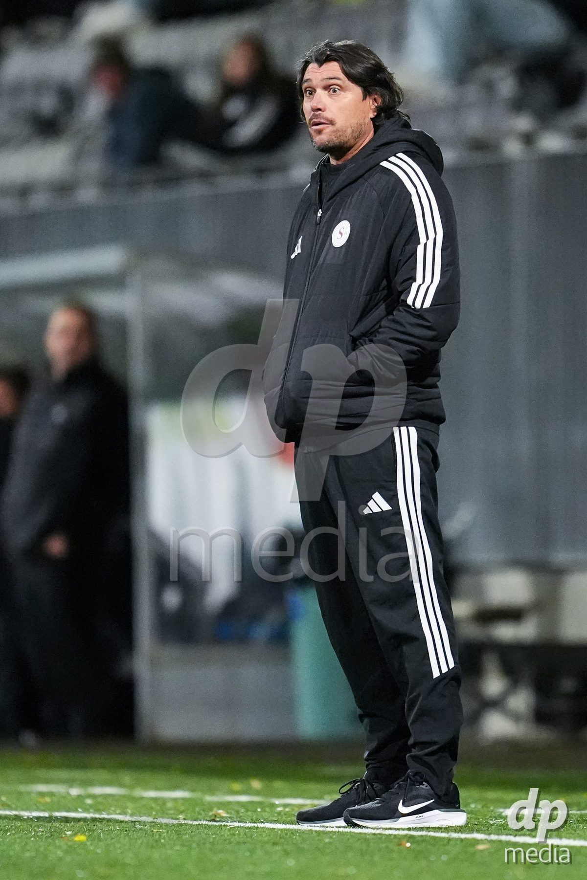 WIL, SWITZERLAND - OCTOBER 24: Cristian Damian Toro, Head Coach of Servette FC Chenois Feminin looks on during the AXA Women's Cup match between FC Wil 1900 and Servette FC Chenois Feminin at Lidl Sportpark on October 24, 2026 in Wil, Switzerland.