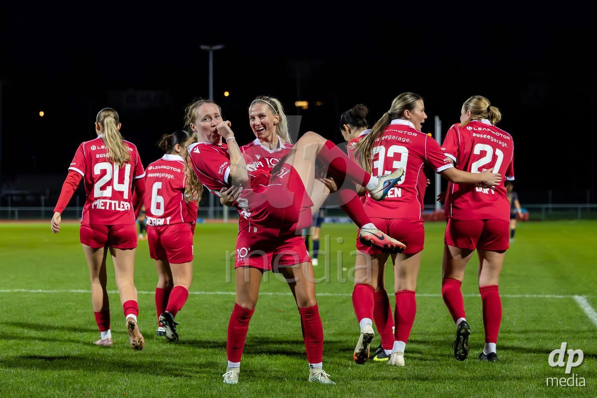 LUZERN, SWITZERLAND - OCTOBER 24: 17 Leyla Mcfarland of FC Rapperswil-Jona and 3 Bergros Asgeirsdottir of FC Rapperswil-Jona celebrates scoring her team's first goal to make the score 0-1 during the AXA Women's Cup match between FC Luzern and FC Rapperswil-Jona at Hubelmatt on October 24, 2026 in Luzern, Switzerland.