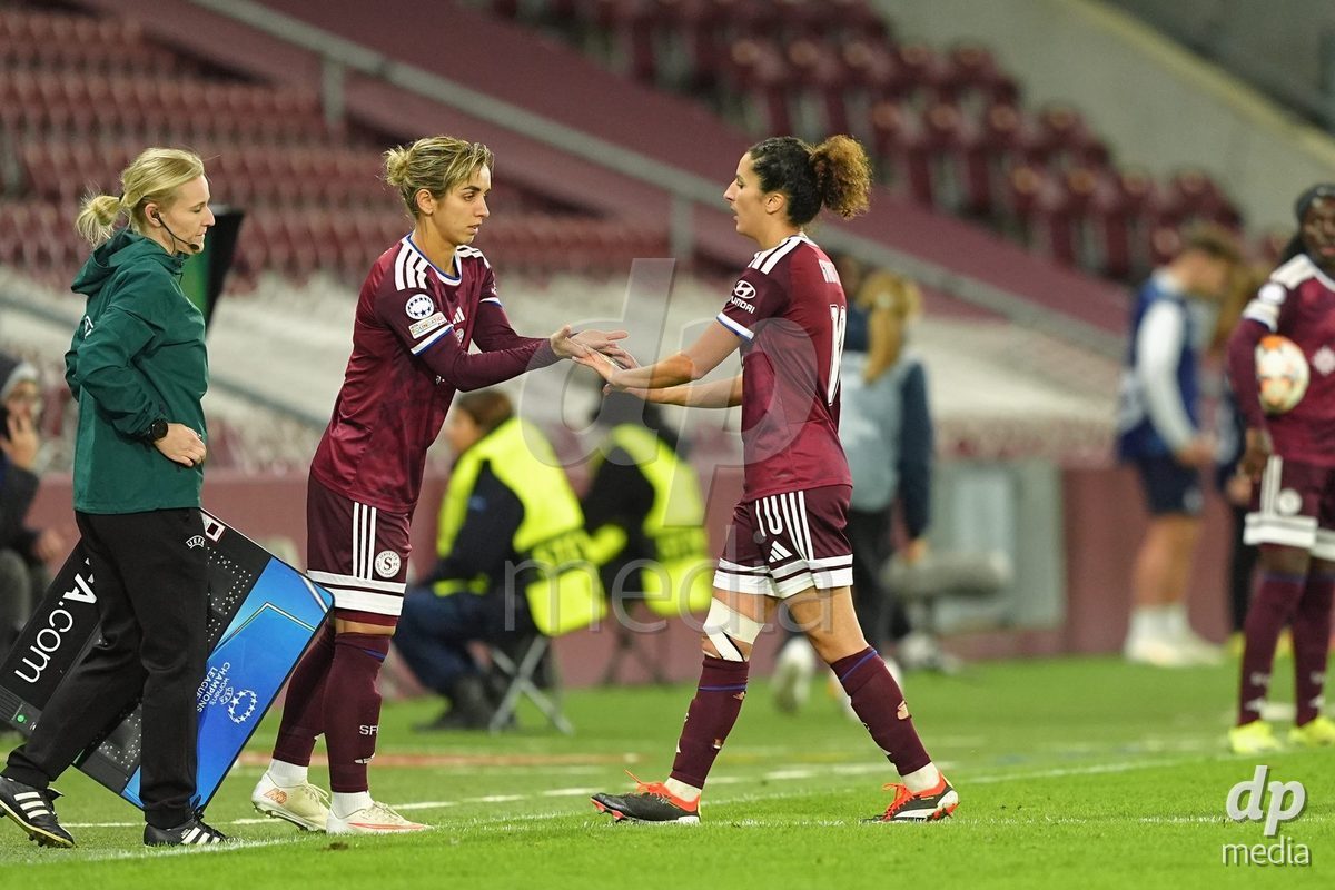GENEVA, SWITZERLAND - OCTOBER 28: Natasha Andonova and Ghoutia Karchouni of Servette FC Chenois Feminin during during substitution at the UEFA Women's Champions League match between Servette FC Chenois Feminin and OH Leuven at Stade de Geneve on October 28, 2026 in Geneva, Switzerland.