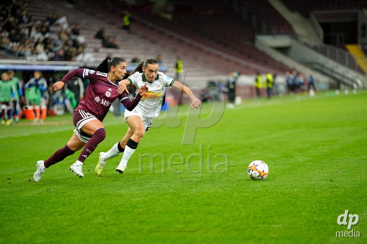 GENEVA, SWITZERLAND - OCTOBER 28: Agathe Ollivier of OH Leuven against Meriame Terchoun of Servette FC Chenois Feminin during the UEFA Women's Champions League match between Servette FC Chenois Feminin and OH Leuven at Stade de Geneve on October 28, 2026 in Geneva, Switzerland.