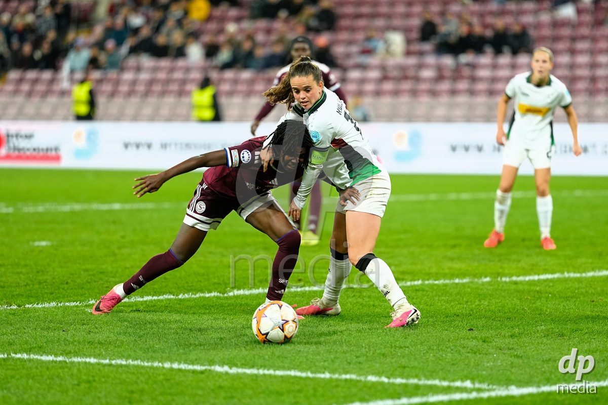 GENEVA, SWITZERLAND - OCTOBER 28: Garance Nein of Servette FC Chenois Feminin against Jeslynn Kuijpers of OH Leuven during the UEFA Women's Champions League match between Servette FC Chenois Feminin and OH Leuven at Stade de Geneve on October 28, 2026 in Geneva, Switzerland.