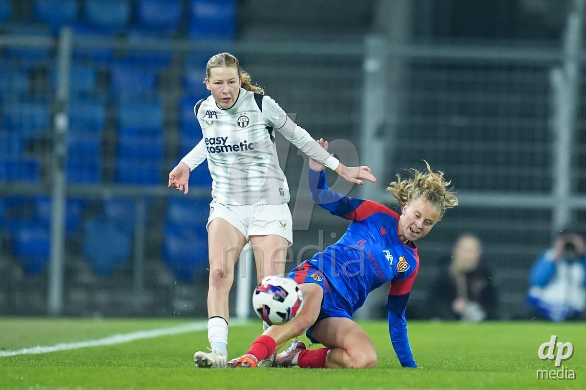 BASEL, SWITZERLAND - OCTOBER 30: Marlene Wild of FC Zurich (L) and Jacqueline Anne Hand of FC Basel 1893 (R) battle for the ball (duel) during the AXA Women's Super League match between FC Basel 1893 and FC Zurich at St. Jakob-Park on October 30, 2026 in Basel, Switzerland.